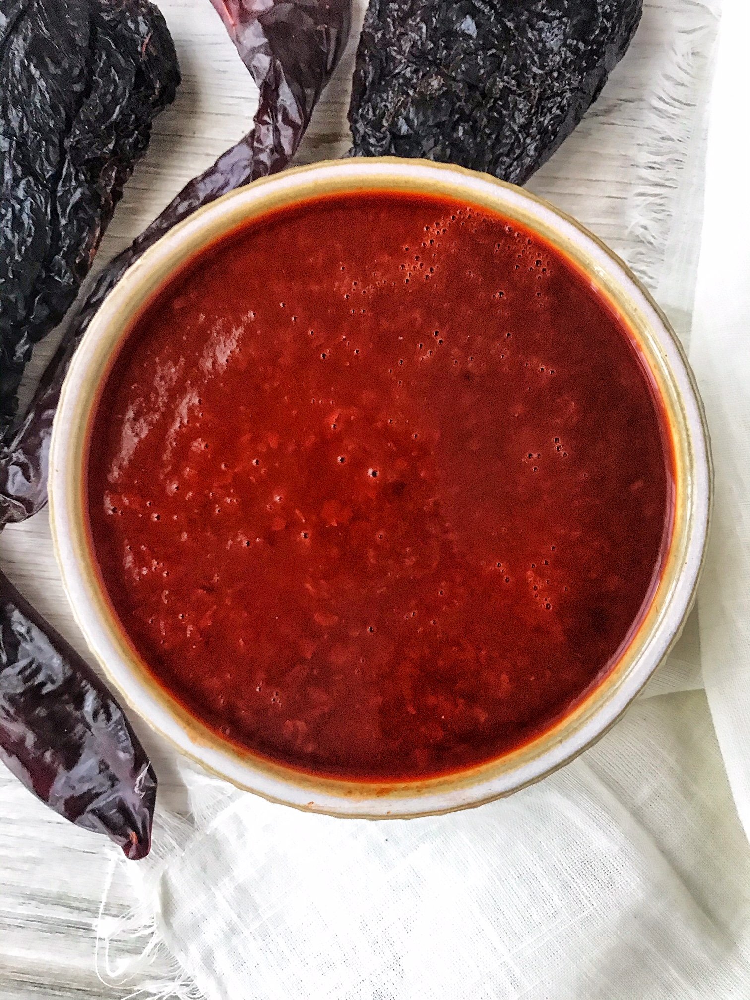 Red sauce made with dried guajillo and ancho peppers.