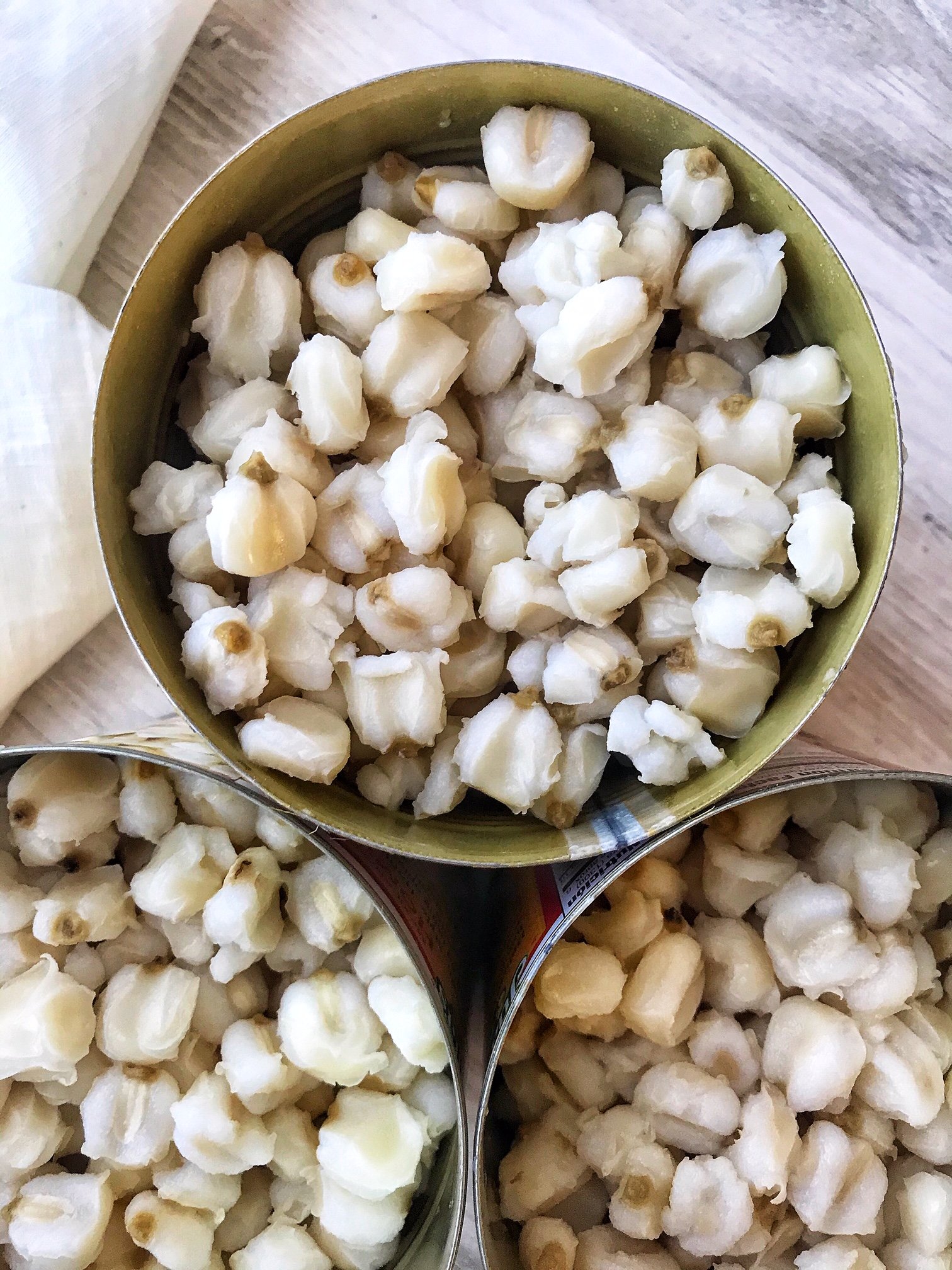 White hominy in cans.